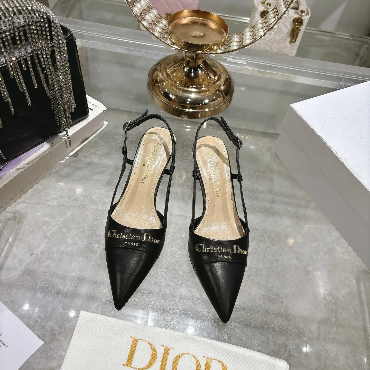 👟👟Ex-factory price 520👟👟 25ss early spring new Dior Dior D-My hardware letter buckle pointed toe high heels flat shoes kitten heel back sandals This My Dior high heels are new products in the 2025 spring and summer ready-to-wear series, showing exquisite elegance. Carefully crafted from cow leather, it has a pointed toe design and is embellished with the Christian Dior Paris signature in gold-finished metal, making it instantly recognizable and highlighting Dior's extraordinary craftsmanship. The hollow decoration 4.5cm and 8.5cm graphic style heels complement each other, making the fashionable design more elegant. Upper: Shandong silk/cow patent leather. Inner foot pad: sheepskin. Sole: Italian genuine leather outsole. Heel height: 4.5 8.5. Size: 35-39 (34.40.41. Customized, non-refundable)